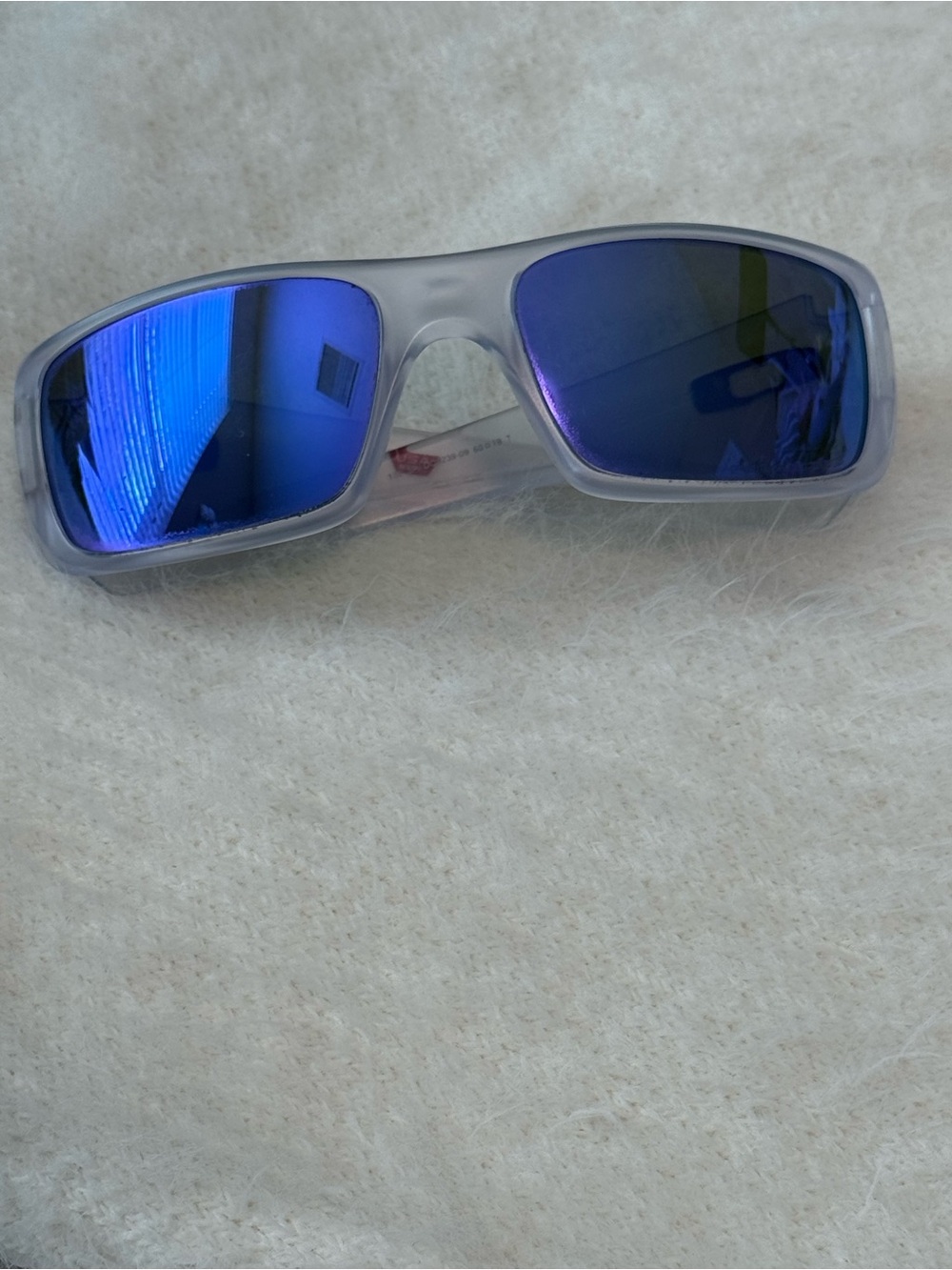 Oakley Sunglasses with Blue Mirrored Lenses and White Frame